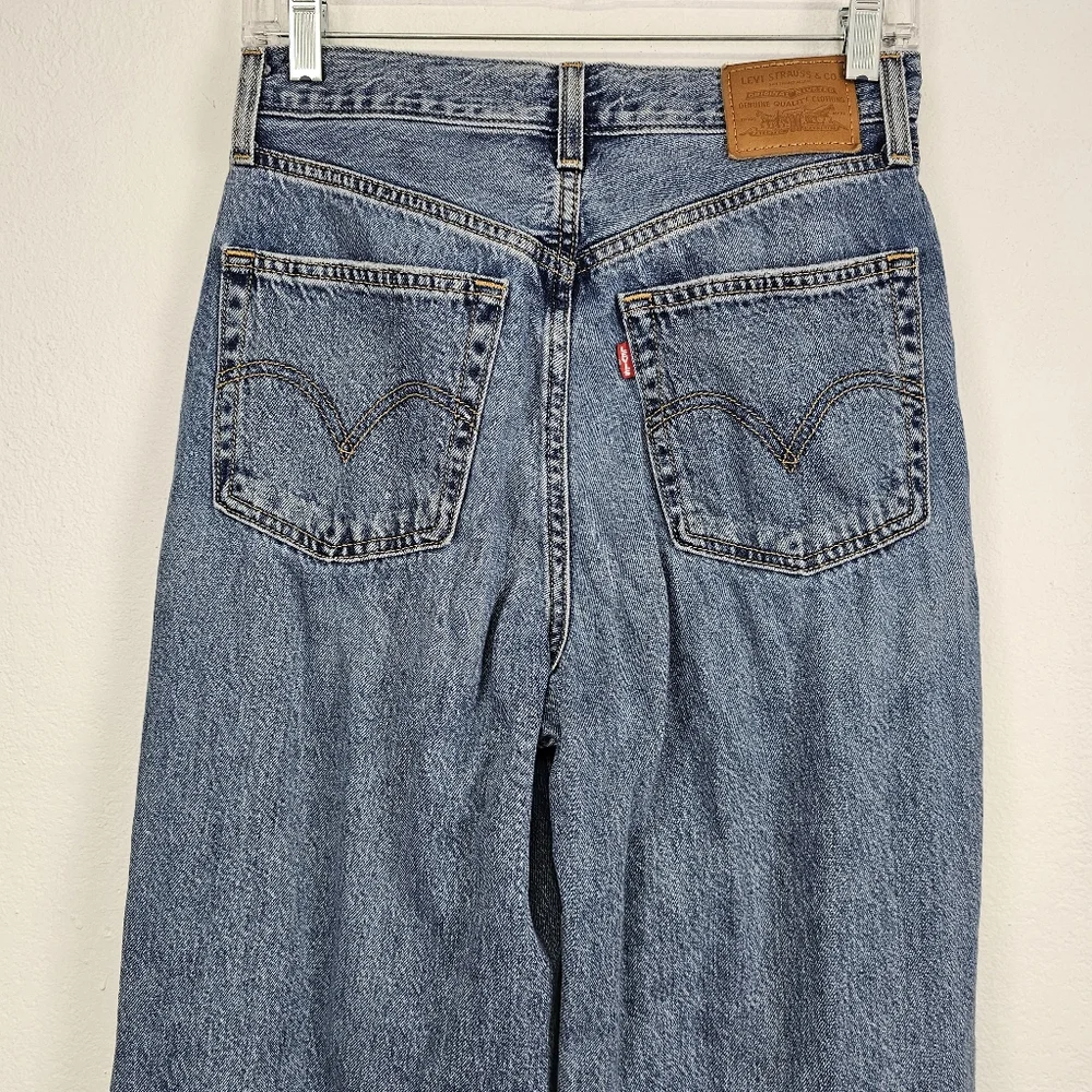 Levi's Premium High Loose Flare Jeans Distressed- Size 27 X 29 - Picture 8 of 12